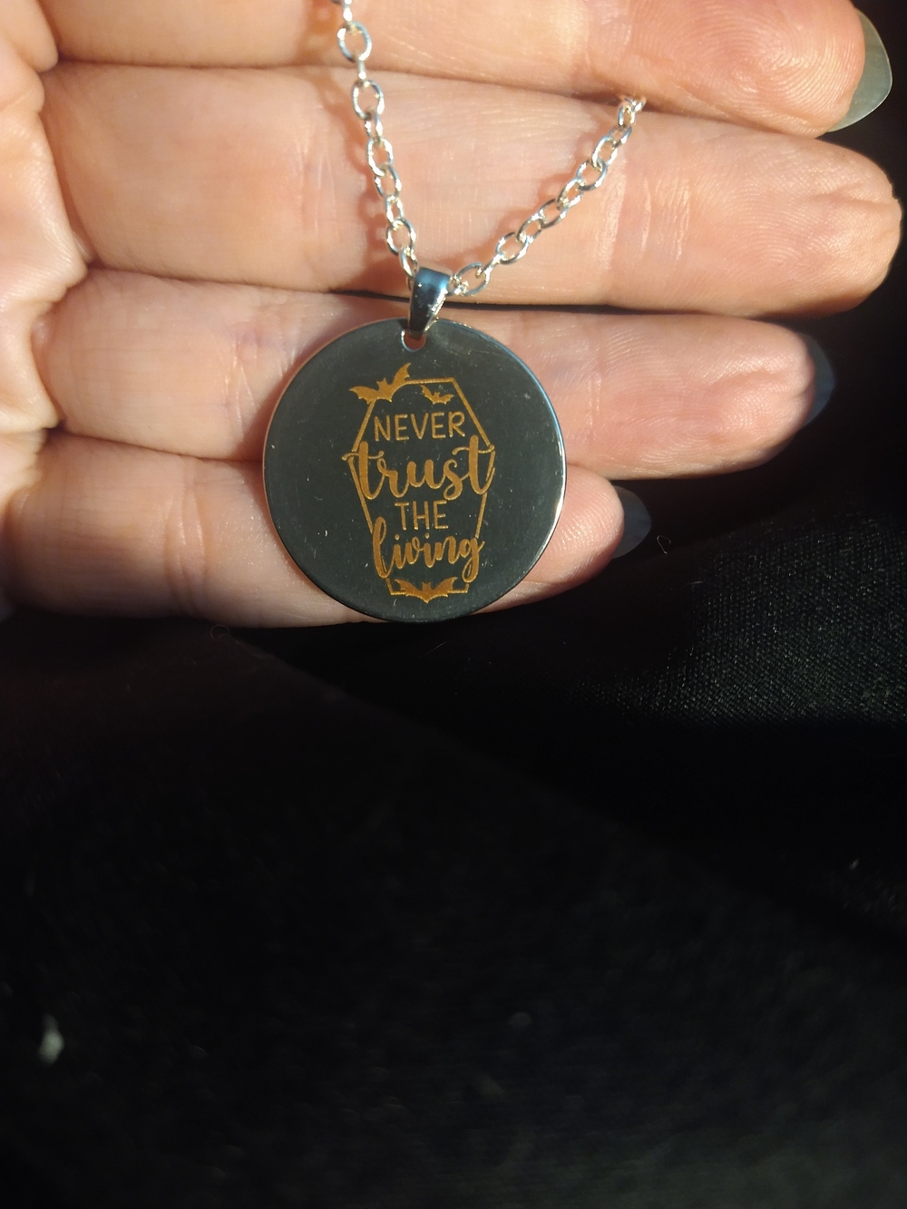 Stainless Steel Round Pendant Necklace - "Never Trust The Living"